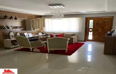 Imagem: A casa possui 4 Dormitórios, 4 Banheiros, 3 Vagas na garagem