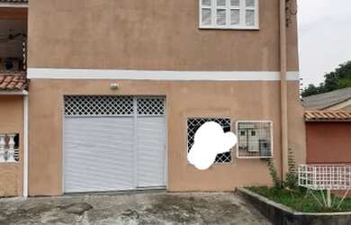 Imagem: A casa possui 3 Dormitórios e 2 Banheiros e está localizado