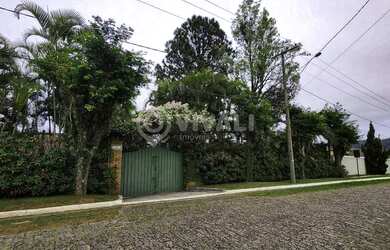 Imagem: A casa em condomínio possui 4 Dormitórios, 4 Banheiros, 5