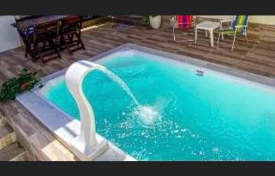 Imagem: A casa possui 2 Dormitórios, 2 Banheiros, 1 Vaga na garagem