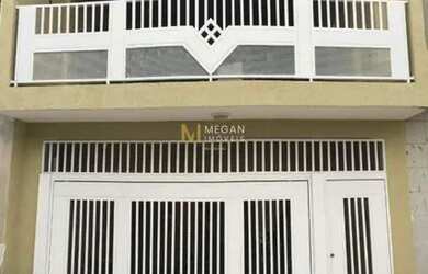 Imagem: A casa possui 3 Dormitórios, 4 Banheiros, 2 Vagas na garagem