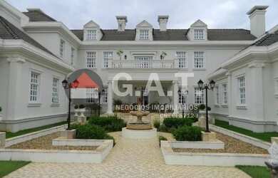 Imagem: A casa em condomínio possui 5 Dormitórios, 4 Banheiros, 4