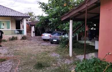 Imagem: A casa possui 5 Dormitórios, 5 Banheiros, 5 Vagas na garagem