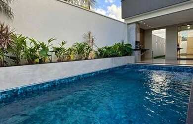 Imagem: A casa possui 3 Dormitórios, 4 Banheiros, 4 Vagas na garagem