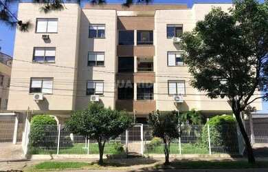 Imagem 14: Apartamento com 1 dormitório, lareira e sacada em bairro arborizado