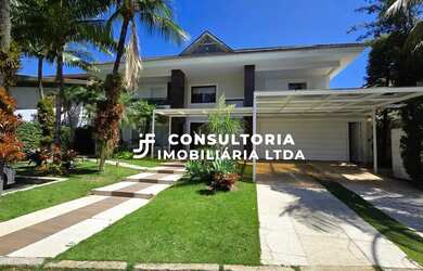 Imagem: A casa em condomínio possui 5 Dormitórios, 5 Banheiros, 5