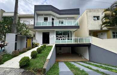 Imagem: A casa em condomínio possui 4 Dormitórios, 5 Banheiros, 5