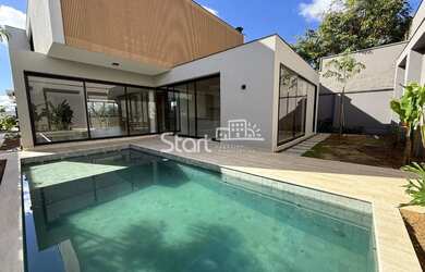 Imagem: A casa em condomínio possui 4 Dormitórios, 5 Banheiros, 5