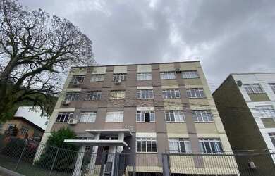 Imagem: O apartamento possui 3 Dormitórios, 1 Banheiro, 1 Vaga na garagem