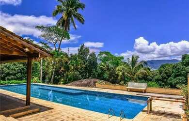 Imagem: A casa possui 2 Dormitórios, 2 Banheiros, 4 Vagas na garagem