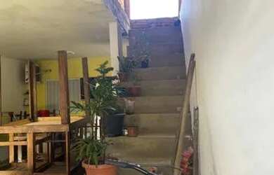 Imagem: A casa possui 2 Dormitórios, 1 Banheiro, 1 Vaga na garagem