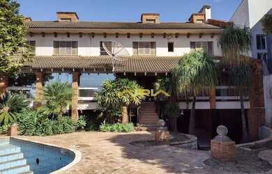 Imagem: A casa para alugar possui 5 Dormitórios, 5 Banheiros, 4 Vagas