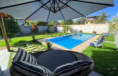 Imagem: A casa possui 2 Dormitórios, 1 Banheiro, 2 Vagas na garagem