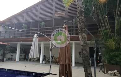 Imagem: A casa em condomínio possui 5 Dormitórios, 5 Banheiros, 5