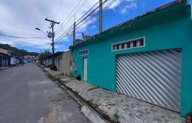 Imagem: A casa possui 2 Dormitórios, 1 Banheiro, 2 Vagas na garagem