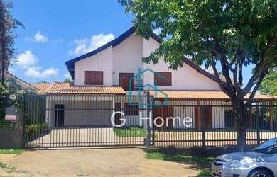 Imagem: A casa possui 5 Dormitórios, 4 Banheiros, 5 Vagas na garagem