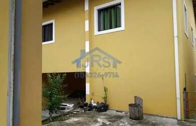 Imagem: A casa possui 5 Dormitórios, 2 Banheiros, 4 Vagas na garagem