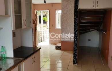 Imagem: A casa possui 2 Dormitórios, 1 Banheiro, 1 Vaga na garagem