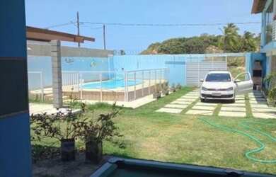 Imagem: A casa possui 5 Dormitórios, 4 Banheiros, 4 Vagas na garagem