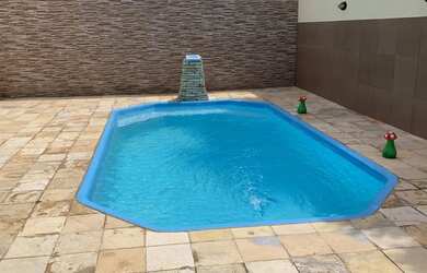 Imagem: A casa em condomínio possui 3 Dormitórios, 3 Banheiros, 2