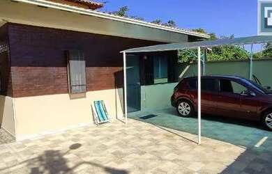 Imagem: A casa possui 2 Dormitórios, 2 Banheiros, 3 Vagas na garagem