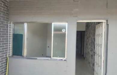 Imagem: A casa possui 2 Dormitórios, 1 Banheiro, 1 Vaga na garagem