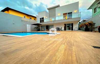 Imagem: A casa e possui 5 Dormitórios, Suítes, 5 Banheiros, 2 Vagas