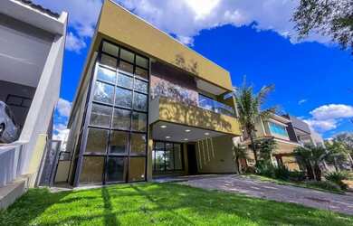 Imagem: A casa em condomínio possui 4 Dormitórios, 5 Banheiros, 2