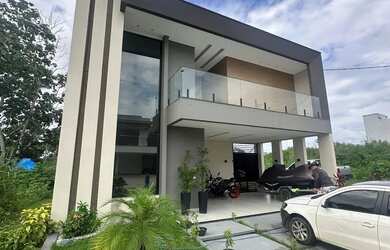 Imagem: A casa em condomínio possui 4 Dormitórios, 5 Banheiros, 4