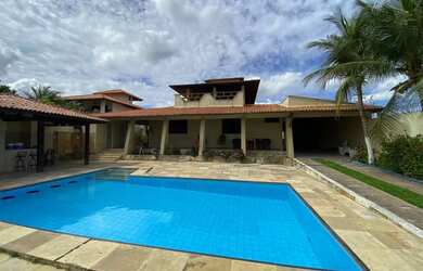 Imagem: A casa possui 3 Dormitórios, 1 Banheiro, 5 Vagas na garagem