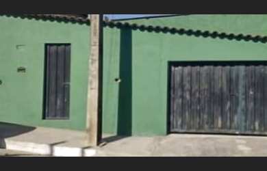 Imagem: A casa possui 3 Dormitórios, 2 Banheiros, 2 Vagas na garagem