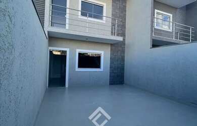 Imagem: A casa possui 3 Dormitórios, 2 Banheiros, 2 Vagas na garagem