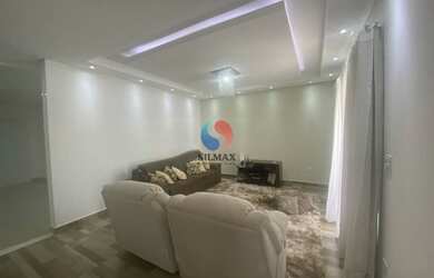 Imagem: A casa possui 3 Dormitórios, 5 Banheiros, 4 Vagas na garagem