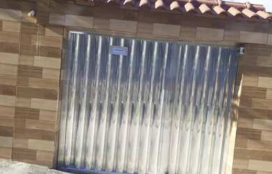 Imagem: A casa possui 2 Dormitórios, 2 Banheiros, 3 Vagas na garagem