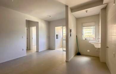 Imagem: O apartamento possui 2 Dormitórios, 1 Banheiro, 1 Vaga na garagem