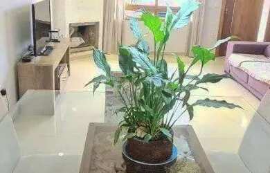 Imagem: A casa possui 3 Dormitórios, 4 Banheiros, 2 Vagas na garagem