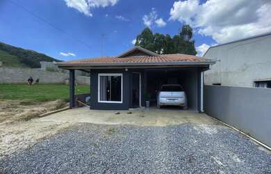 Imagem: A casa possui 2 Dormitórios, 1 Banheiro, 1 Vaga na garagem