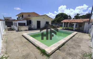 Imagem: A casa possui 4 Dormitórios, 4 Banheiros, 2 Vagas na garagem