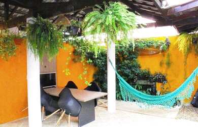 Imagem: A casa em condomínio possui 5 Dormitórios, 5 Banheiros, 2