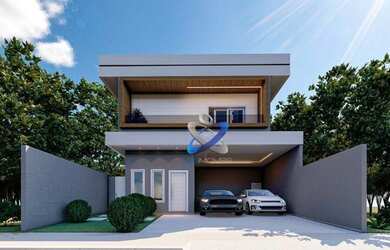 Imagem: A casa possui 3 Dormitórios, 2 Banheiros, 2 Vagas na garagem