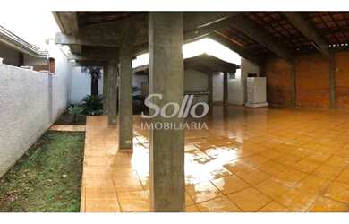 Imagem: A casa possui 5 Dormitórios, 5 Banheiros, 4 Vagas na garagem