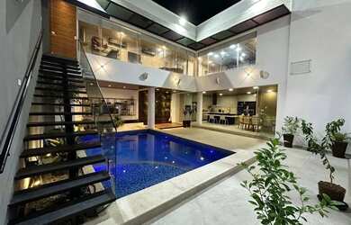 Imagem: A casa em condomínio possui 4 Dormitórios, 5 Banheiros e Imóvel