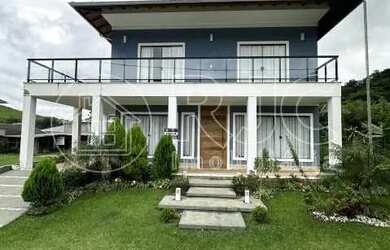 Imagem: A casa em condomínio possui 4 Dormitórios, 4 Banheiros, 2