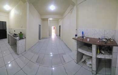 Imagem: A casa possui 2 Dormitórios e 2 Banheiros e está localizado