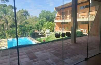 Imagem: A casa em condomínio possui 4 Dormitórios, 5 Banheiros, 5