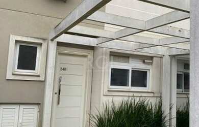 Imagem: A casa possui 2 Dormitórios, 3 Banheiros, 1 Vaga na garagem