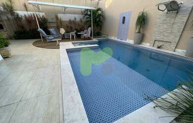 Imagem: A casa possui 5 Dormitórios, 5 Banheiros, 4 Vagas na garagem