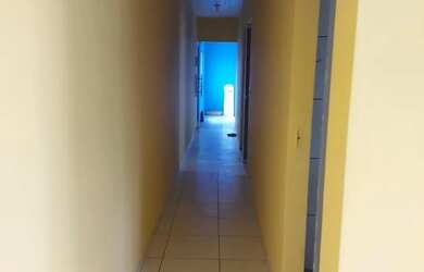 Imagem: A casa possui 2 Dormitórios, 1 Banheiro e está localizado