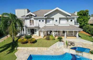 Imagem: A casa em condomínio possui 4 Dormitórios, 5 Banheiros, 5