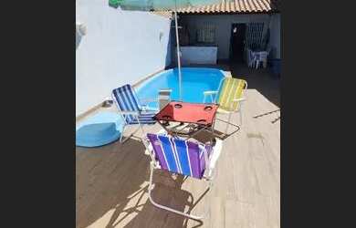 Imagem: A casa possui 2 Dormitórios, 3 Vagas na garagem e está localizado